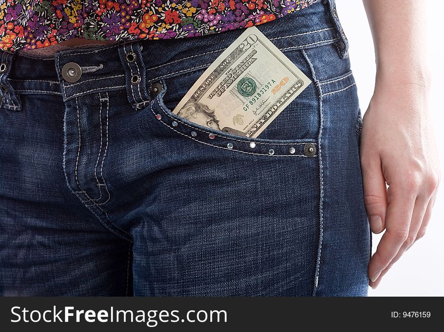 Couple of 20 Dollar-Banknote in a woman's Jeans. Couple of 20 Dollar-Banknote in a woman's Jeans.