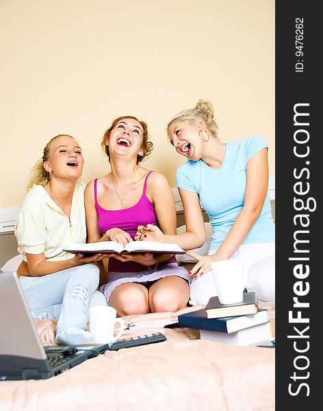 Three Laughing Students