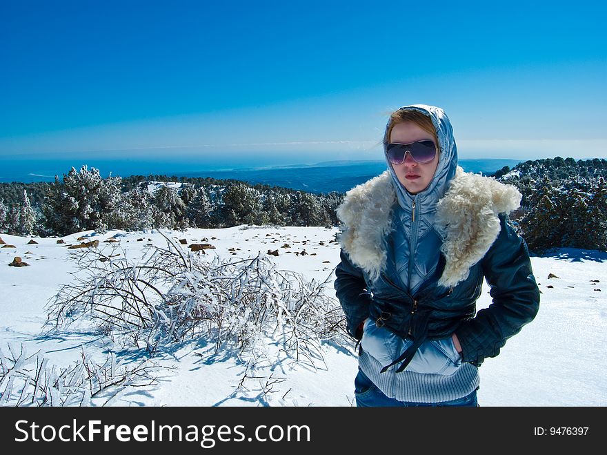 Young girl in the mountains, tourist, researcher