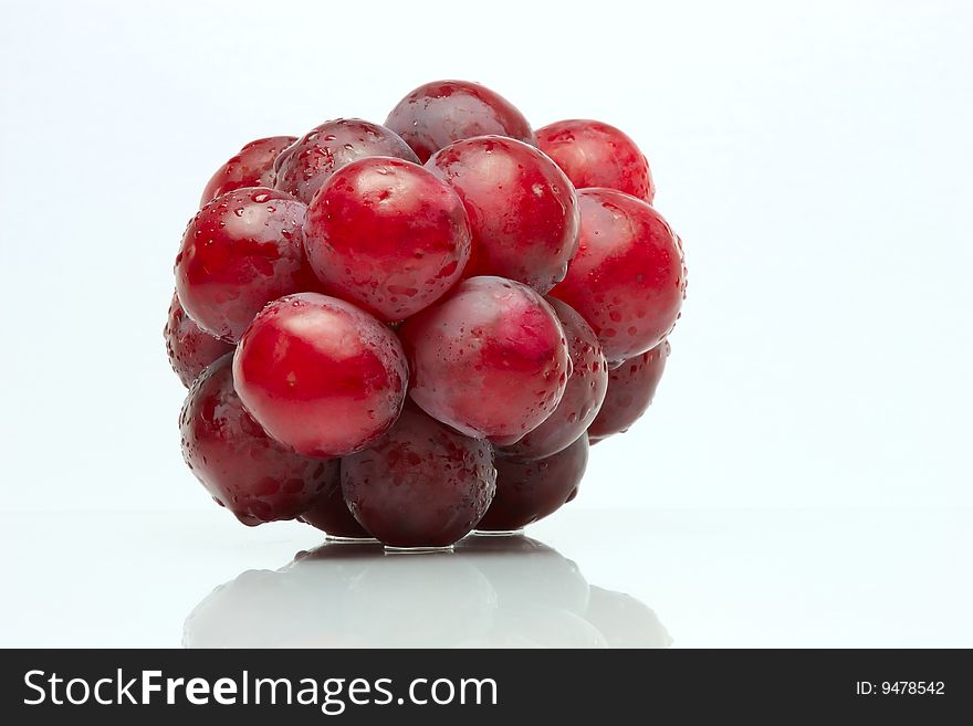 Cluster of grapes isolated on white background