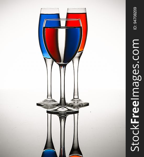 Three glasses with liquid with refraction. Three glasses with liquid with refraction.