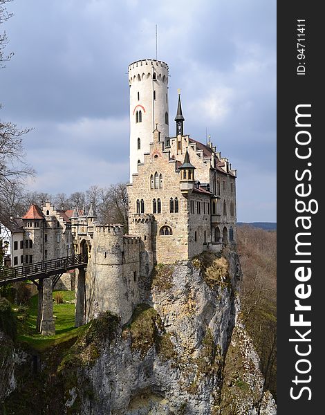 Gray And White Castle Built Near A Cliff