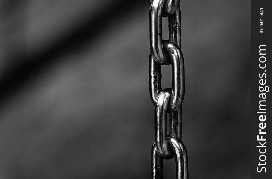 Closeup of stainless steel chain links.