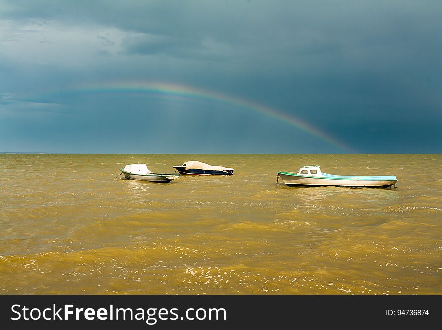 Boats In The Yellow Waters