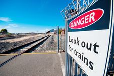 Danger Sign Along Railway Royalty Free Stock Photo