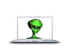 Alien Head On Laptop Screen Royalty Free Stock Photo