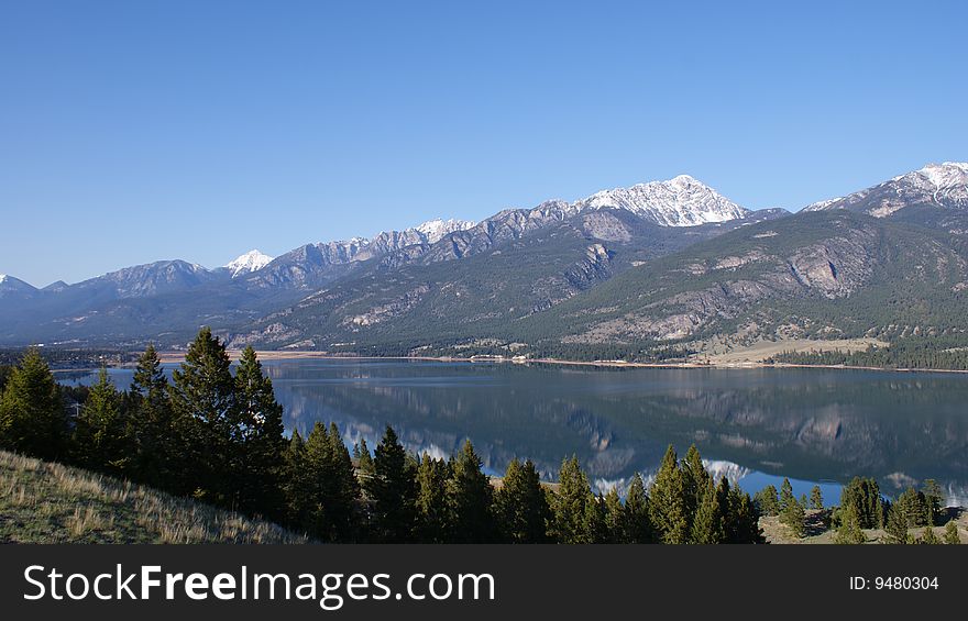 Columbia Lake nestled beside the Rocky Mountains in the East Kootenay region of British Columbia.