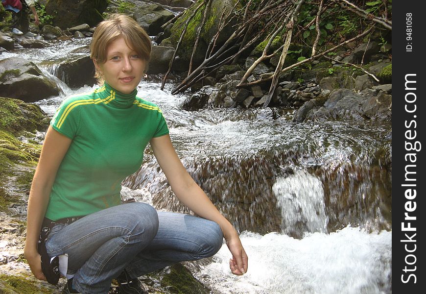 Girl ashore the small river in siney of kofotchke