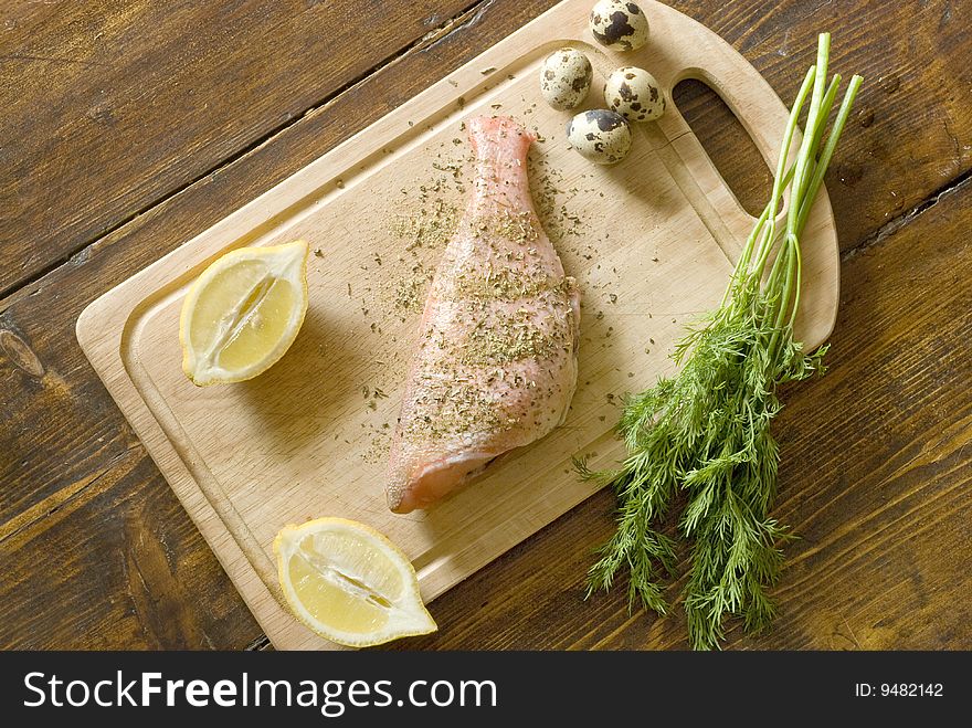 Raw fish with herbs and lemon. Raw fish with herbs and lemon