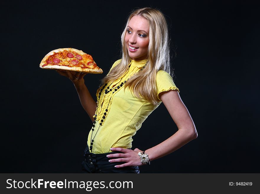 Beautiful Young Woman Eating Pizza