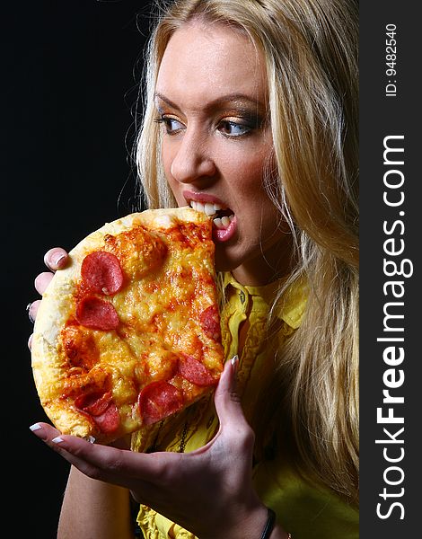 Beautiful Young Woman Eating Pizza