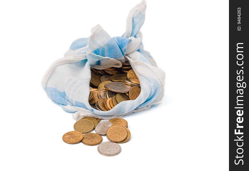 Bundle with coins of different dignity on a white background, isolated. Bundle with coins of different dignity on a white background, isolated