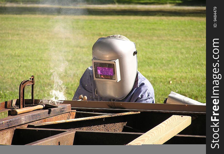 Teaching the nephew how to weld. Teaching the nephew how to weld.