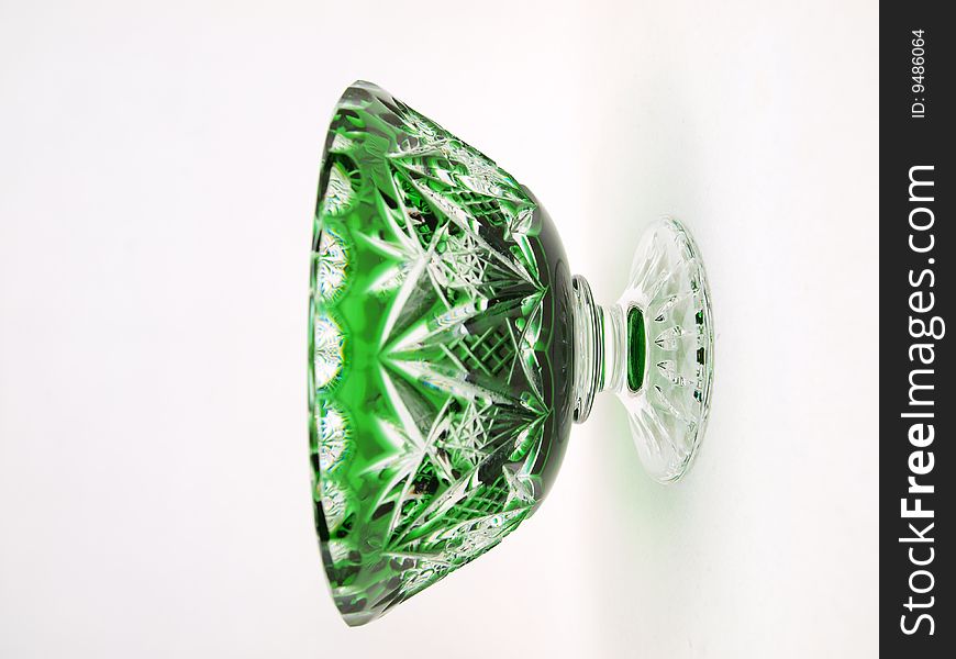 Front view of decorative green colored clear crystal ornamental jar for multipurpose usage like storing keys, coins, pins, & etc. Front view of decorative green colored clear crystal ornamental jar for multipurpose usage like storing keys, coins, pins, & etc.