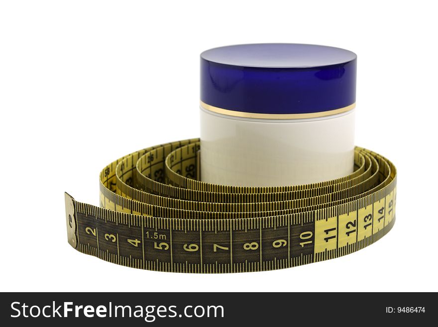 Container with cosmetic cream and measuring tape isolated on the white background. Container with cosmetic cream and measuring tape isolated on the white background