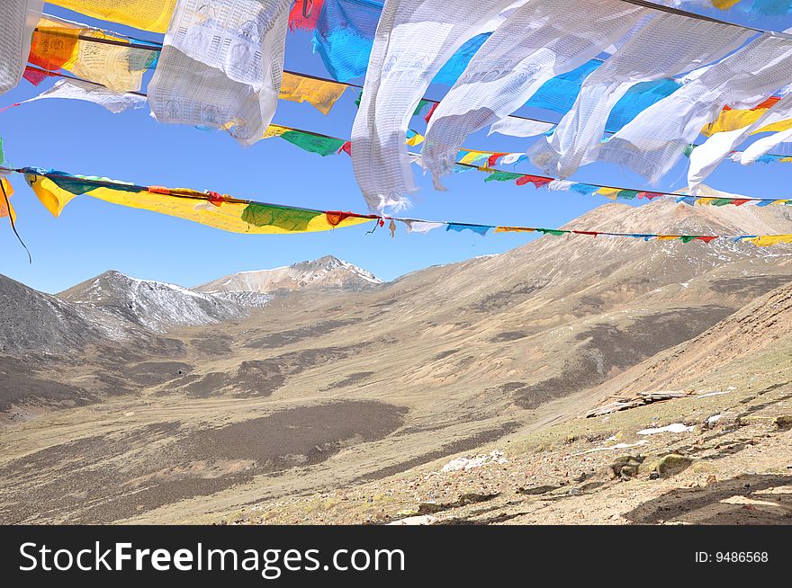 Prayer Flags And Mountains In Tibet