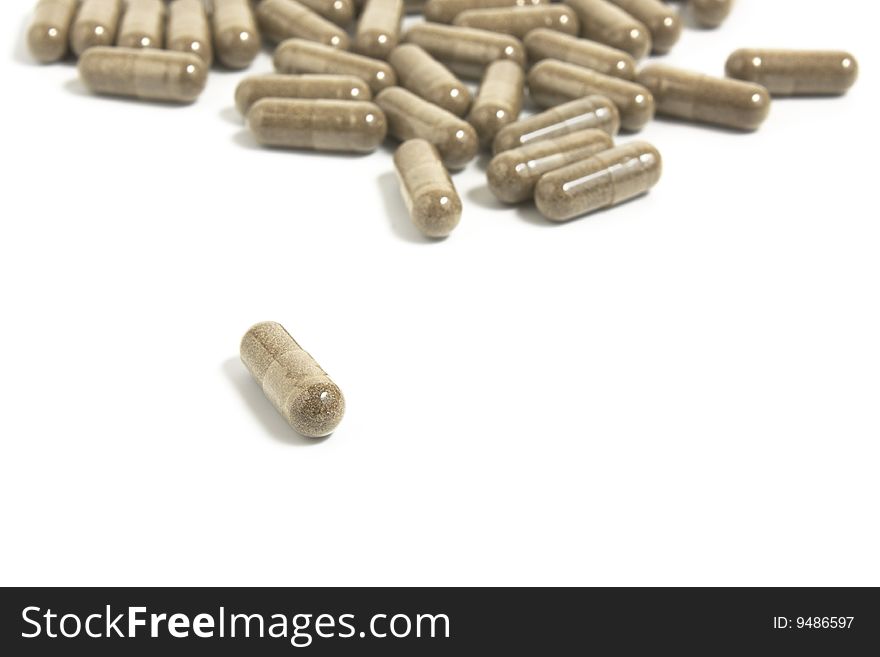 Gray pills on  white background it is isolated