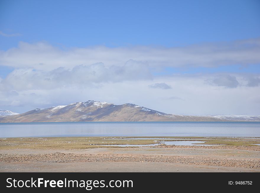 Snow Mountain And Lake In Tibet