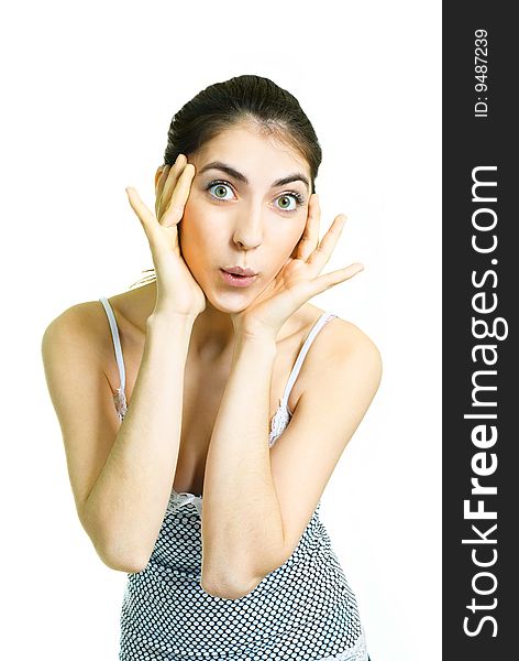 Portrait of a beautiful young surprised woman closing her face with hands. Portrait of a beautiful young surprised woman closing her face with hands