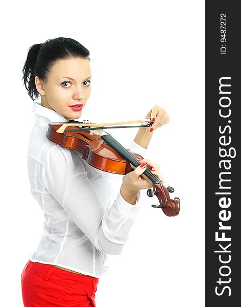 Portrait of a pretty young woman playing the violin. Portrait of a pretty young woman playing the violin