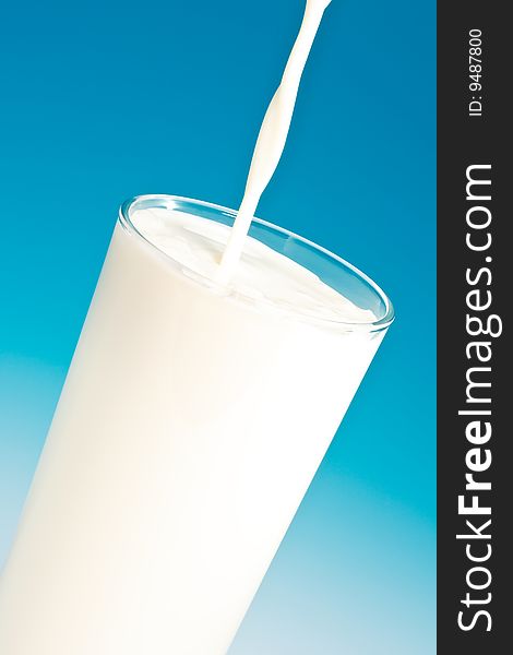 Cool fresh milk in a tall glass