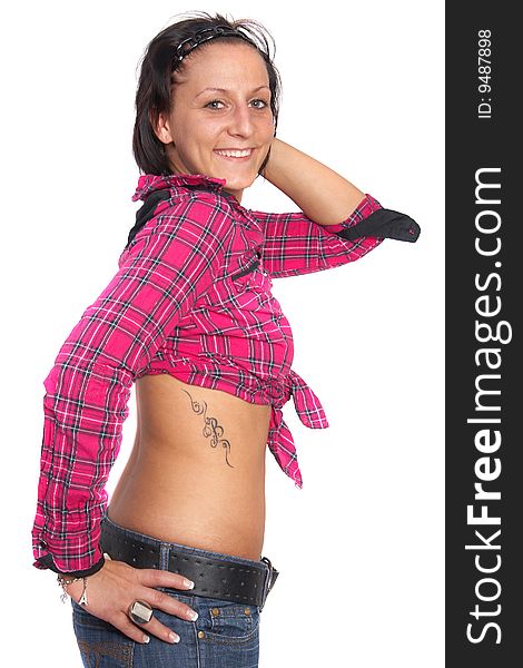 Portrait of a young woman wearing a pink shirt and ripped blue jeans. She is showing off her beautiful tattoo. Isolated over white. Portrait of a young woman wearing a pink shirt and ripped blue jeans. She is showing off her beautiful tattoo. Isolated over white.