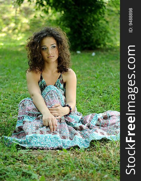 Smile teen standing on field in a park