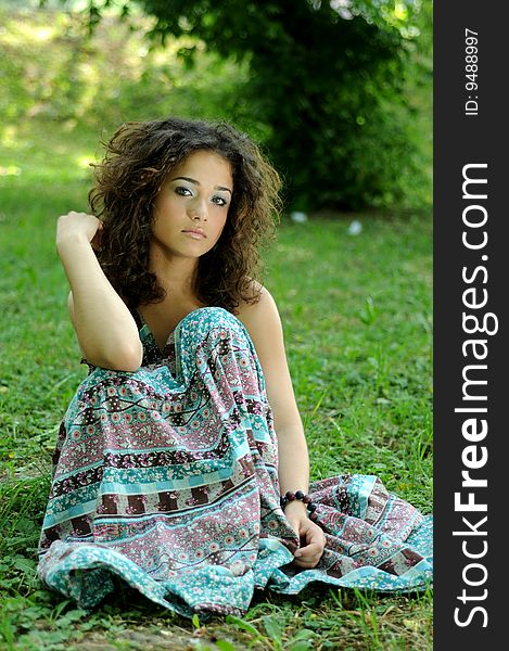 Smile teen standing on field in a park