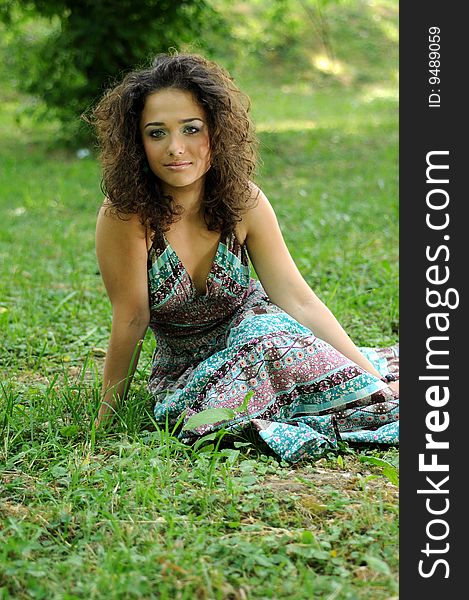 Smile teen standing on field in a park