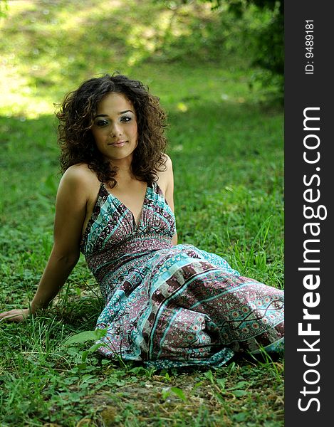 Smile teen standing on field in a park