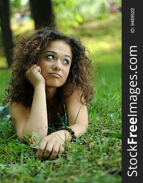 Smile teen standing on field in a park