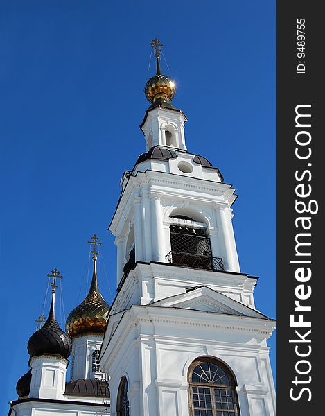 The white church with golden domes