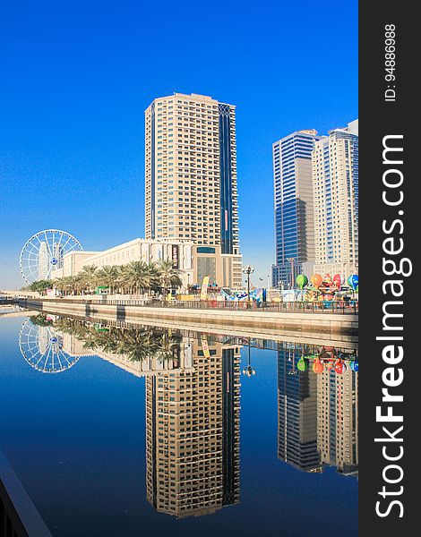 Reflection Of Buildings In City