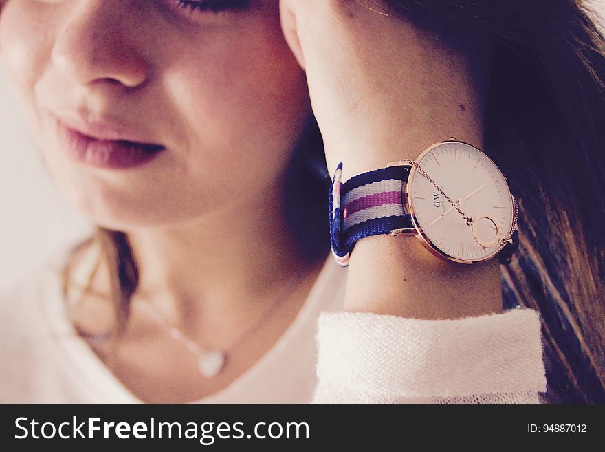 Closeup of girl with wrist watch