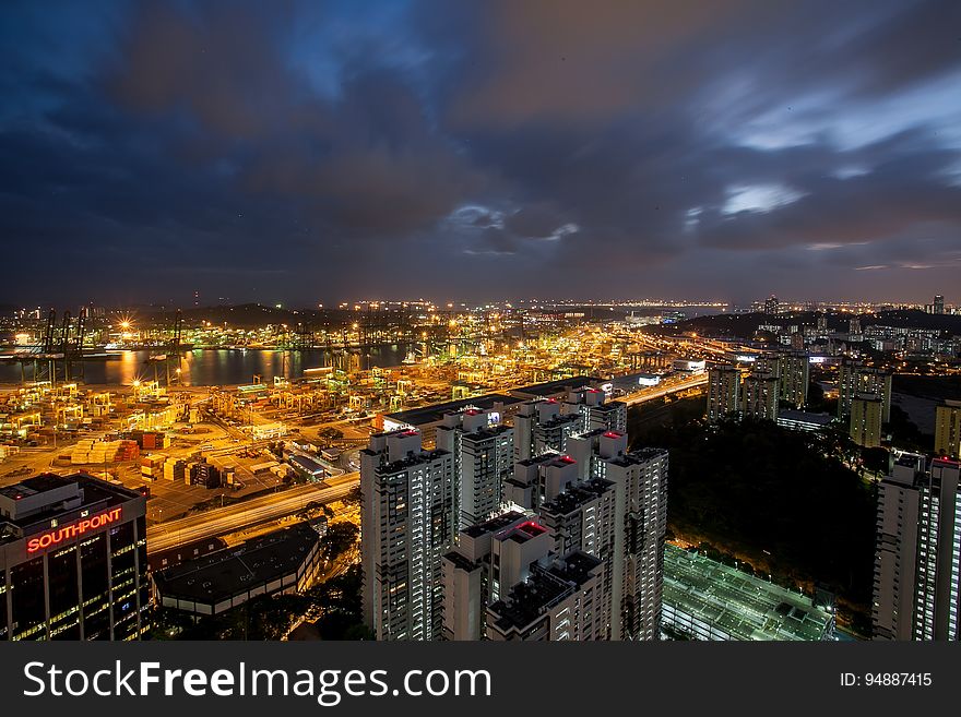 Aerial view of city illuminated at night. Aerial view of city illuminated at night.