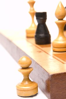 Chessmen On A Chessboard Stock Photos