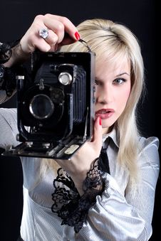 Blonde With Camera Royalty Free Stock Photography Blonde With Camera Royalty Free Stock Photography