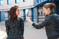 Two Girls Take Pictures On A Street Stock Images Two Girls Take Pictures On A Street Stock Images