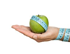 Hand With Apple And Measuring Tape Stock Photos Hand With Apple And Measuring Tape Stock Photos