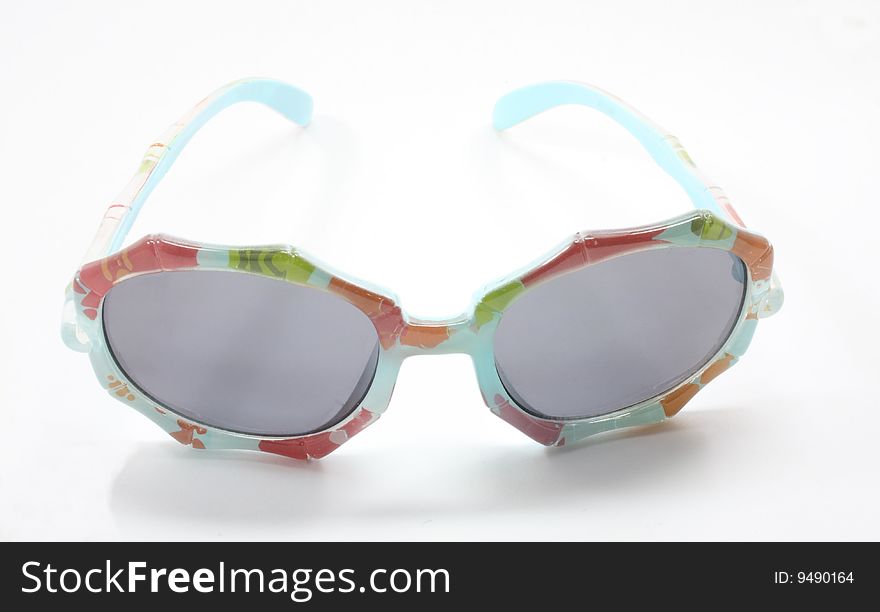 Little girls sunglasses on a white background.