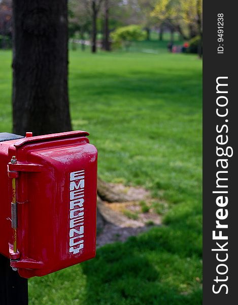 Red Emergency Phone Box in Garden. Red Emergency Phone Box in Garden