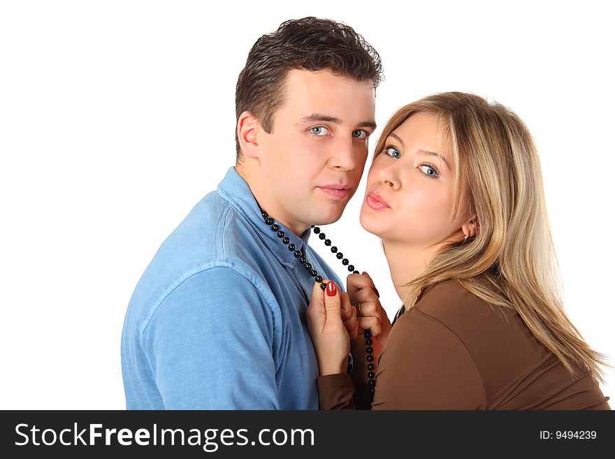 Girl holds man for beads on white background