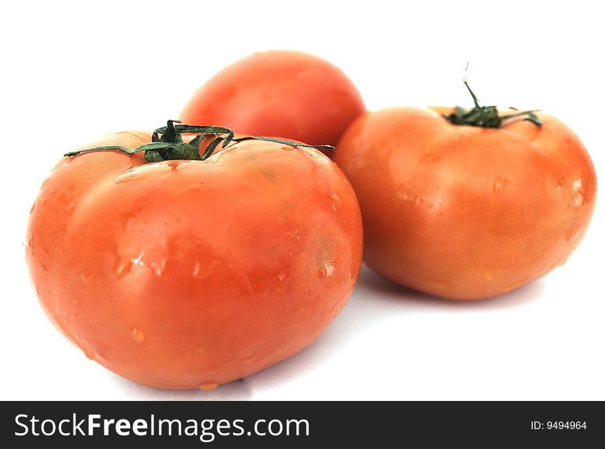 Three Tomatoes on white background