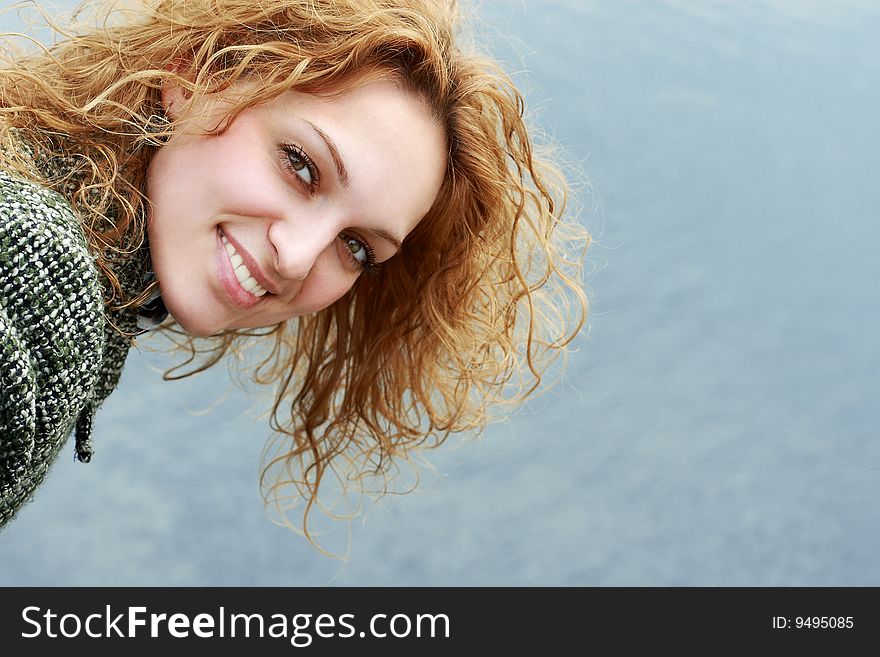 A beautiful young woman smiling