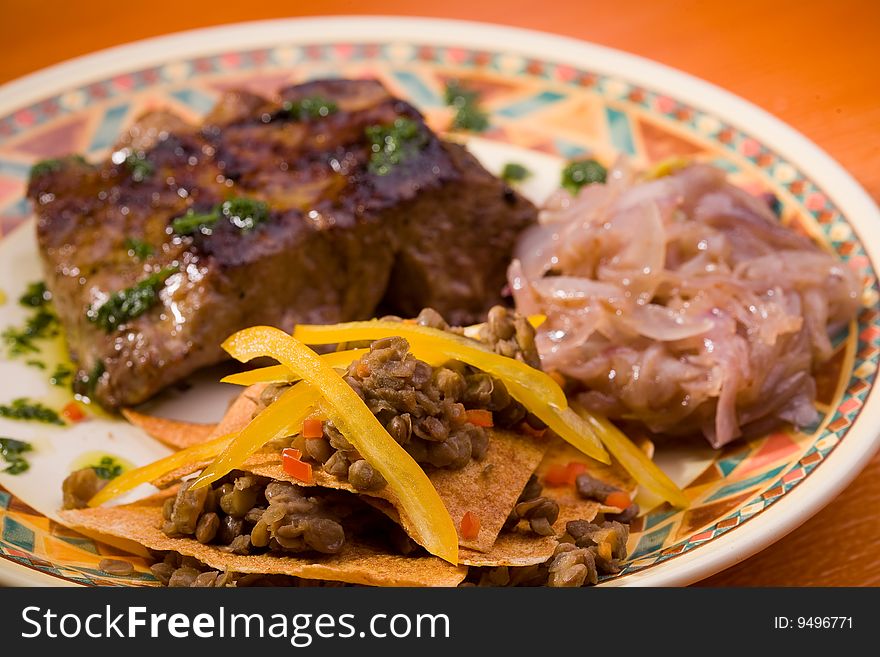 Mexican closeup steak with cabbage and peanuts, studio shot