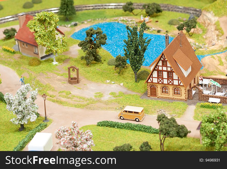 Village miniature with house and lake