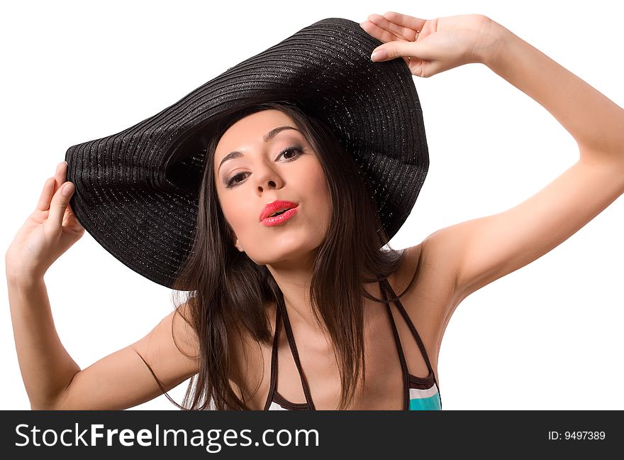Kissing brunette in big hat on white with clipping path