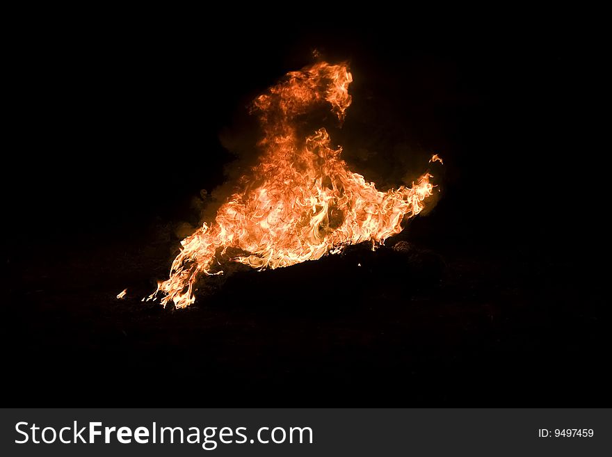 Flame burning campfires nf black background