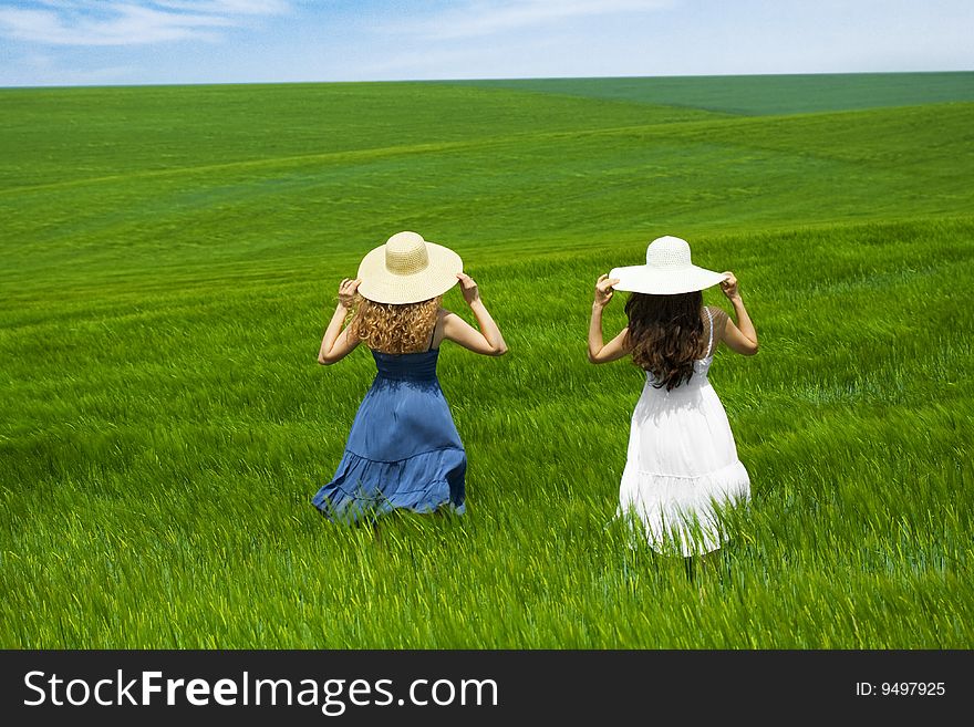 Two girls in a wheat field. Two girls in a wheat field