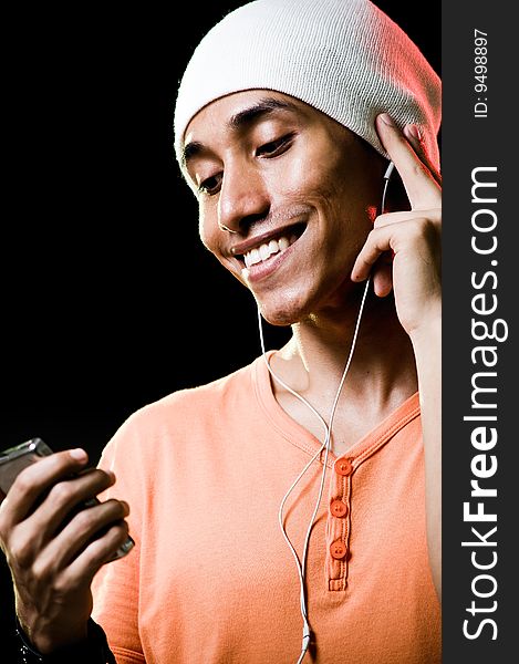 Asian Male Listening To Music